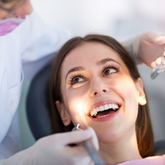 smiling man at the dentist